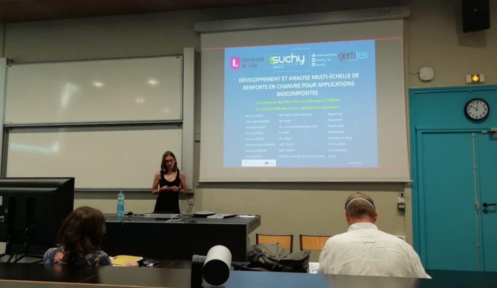 Image of a PhD Defense with a candidate and a Jury